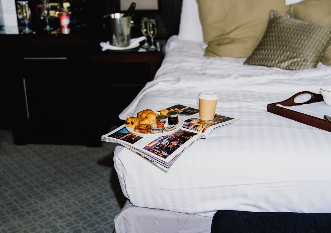 about-us breakfast-tray-with-croissants-and-coffee-on-bed-qlkjajjw-gq